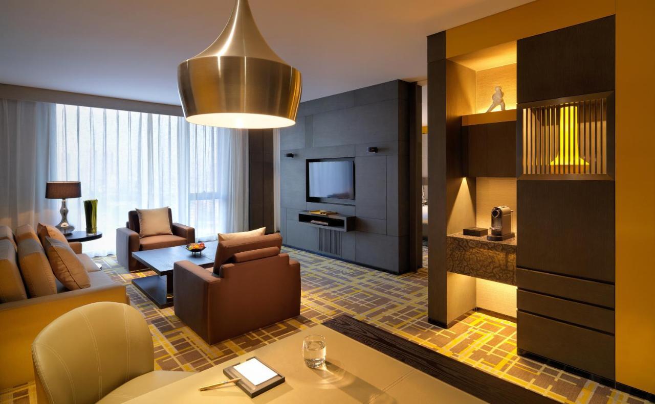 Hotel Hyatt Regency Tianjin East Habitación foto